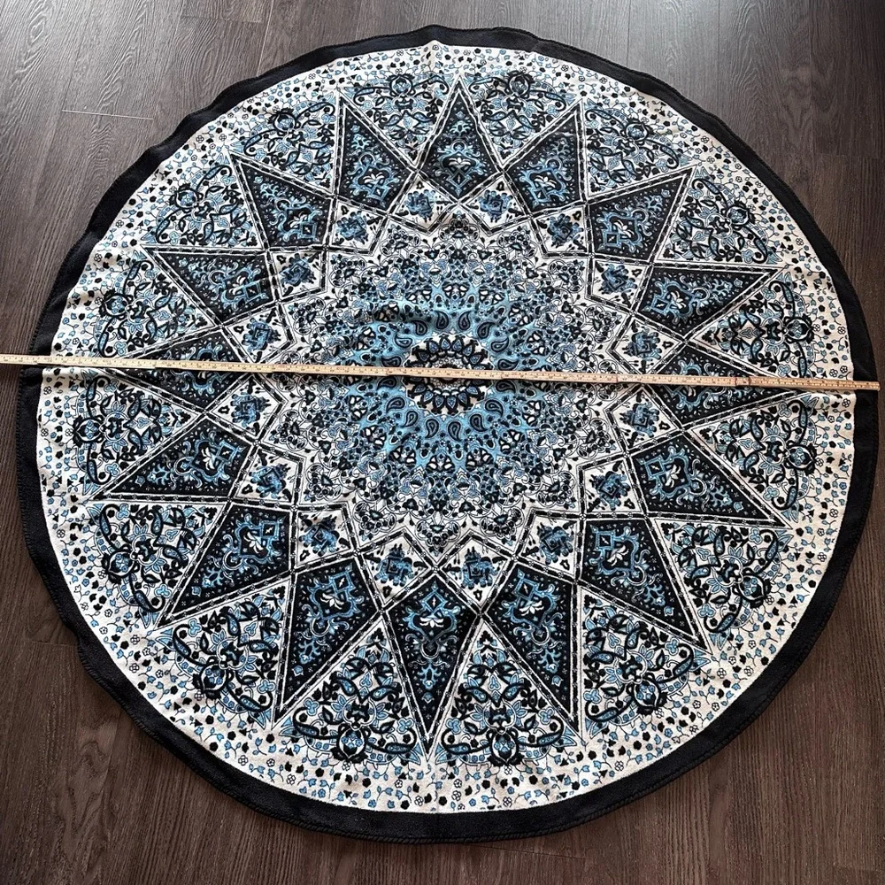 Round Blue Mandala Beach Towel in blue and black print